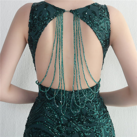 Vestido de gala verde con lentejuelas y espalda descubierta / Bella