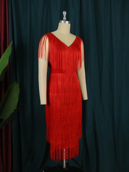 Vestido de flecos disponible también en rojo