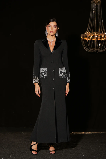 Vestido negro largo , con cristales en bolsillos y puños , detalle botones / ann