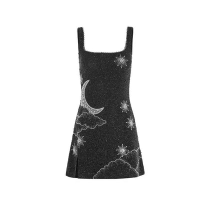 Vestido corto negro con detalle luna en piedras