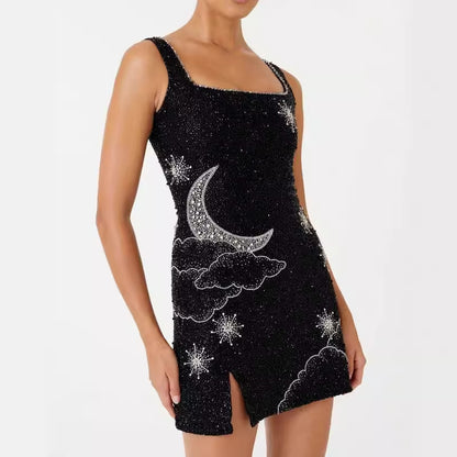 Vestido corto negro con detalle luna en piedras