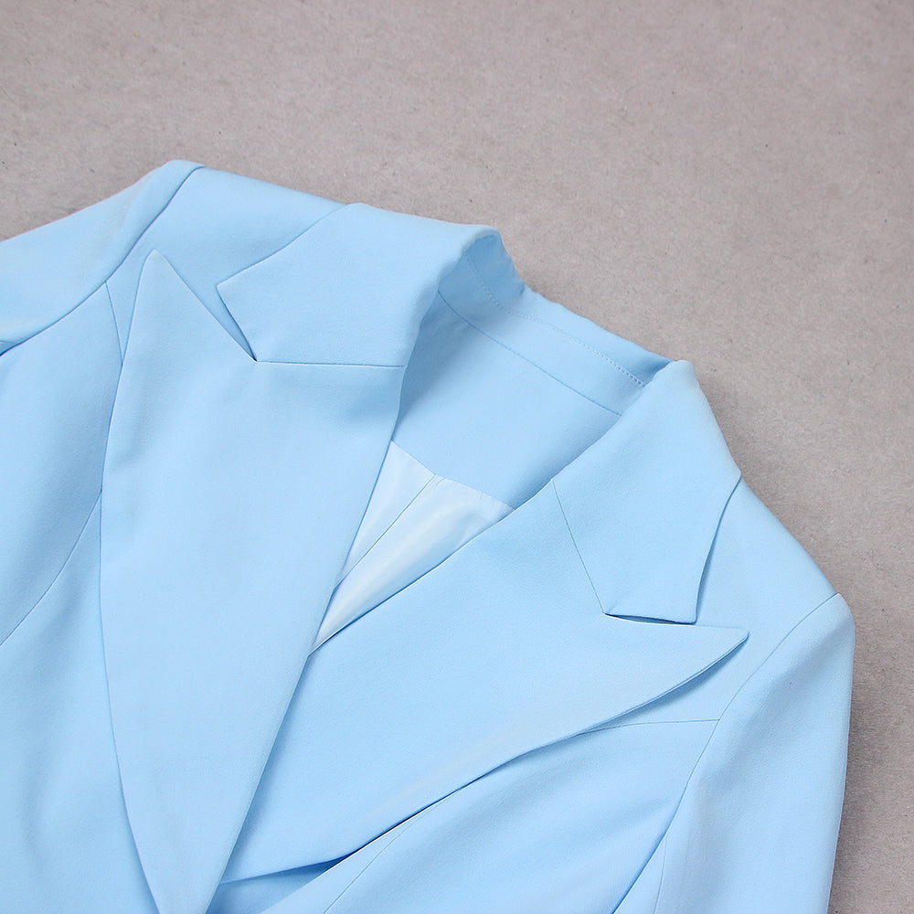 Blazer color celeste detalles plateados