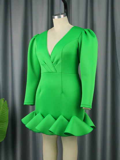 Vestido corto verde vuelos