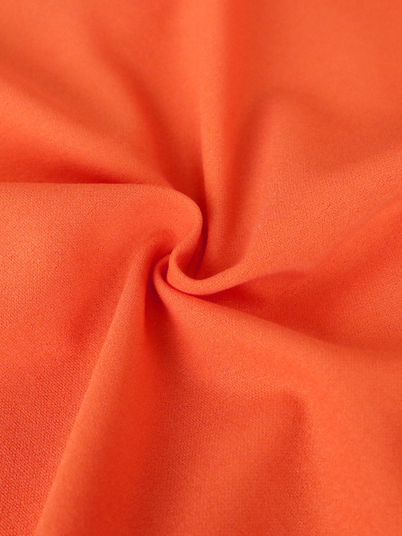 Vestido bandage color naranja terminado en volante