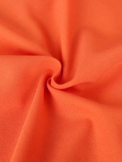 Vestido bandage color naranja terminado en volante