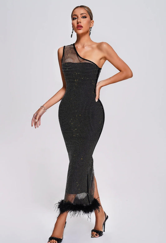 Vestido negro transparencia , bajo con plumas negras