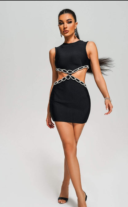 Vestido bandage color negro con cadenas plateadas