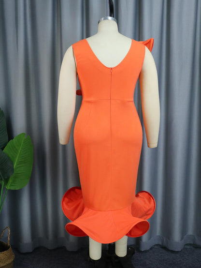 Vestido bandage color naranja terminado en volante