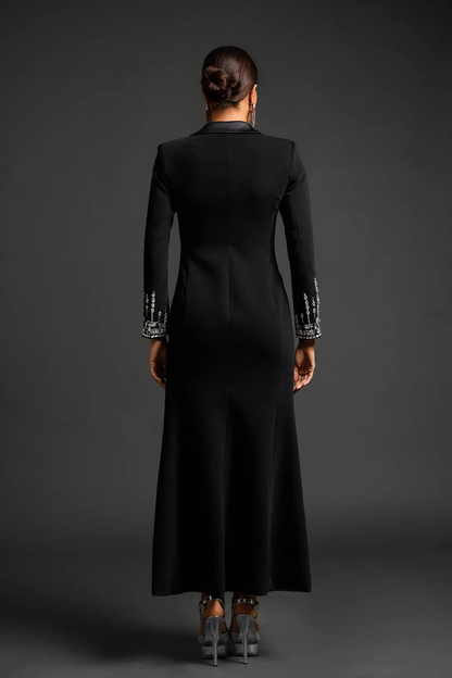 Vestido negro largo , con cristales en bolsillos y puños , detalle botones / ann