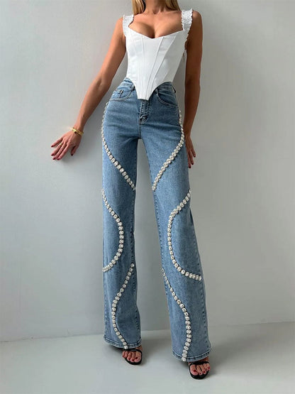 Jeans largos con tiro alto y detalles Diamond