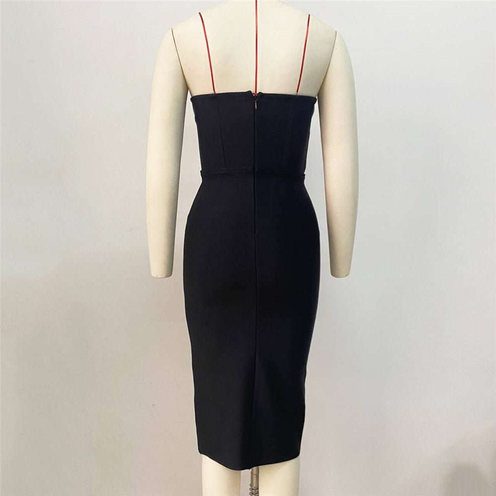 Vestido bandage negro con detalle de corazón plateado , acabado en corset