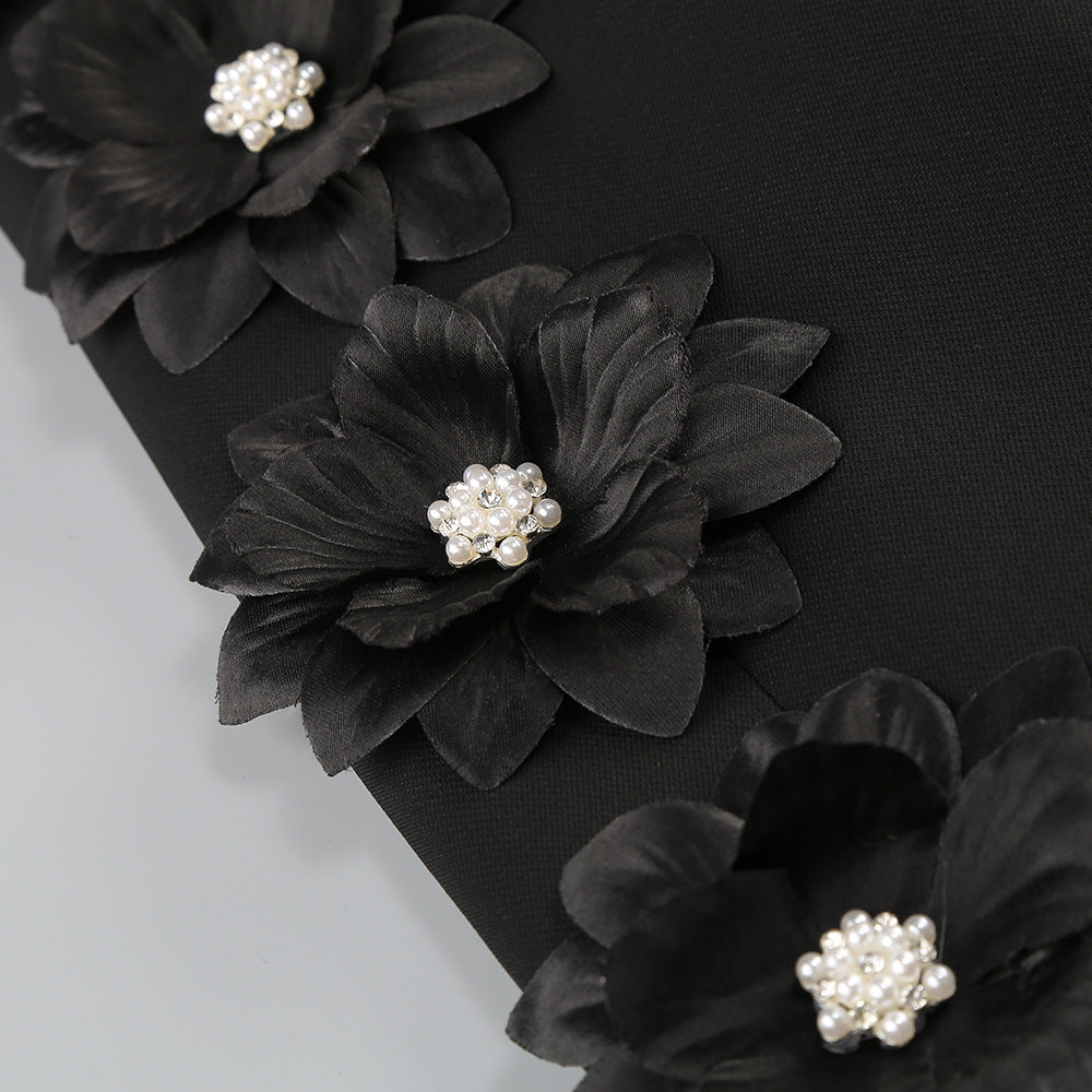 Blazer + pantalón color negro con flores en manga en perlas blancas